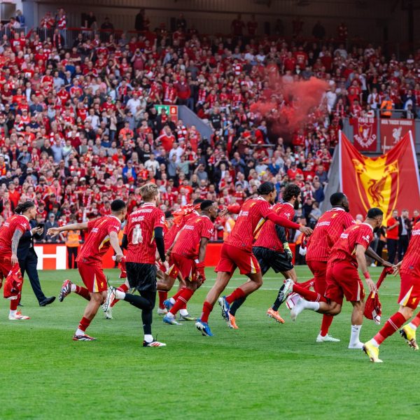 Liverpool-FC-Image-4-scaled Liverpool players run towards The Kop in celebration after clinching the 2024/25 Premier League title.
